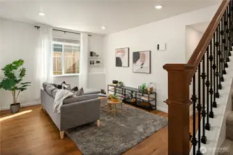 Now down to the lower level and rec room. The open wood and iron railing provide a nice contrast in materials.
