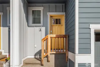 This is the door off the garage side and walks right onto the main living area for easy access to the kitchen with groceries.