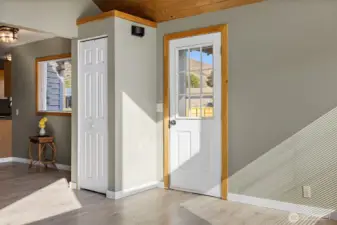 Side entry Kitchen door with coat closet