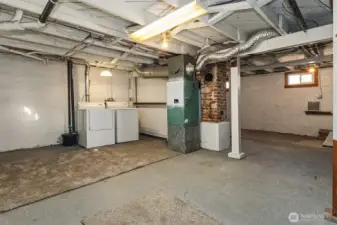 Laundry in the unfinished basement