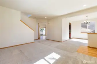 Formal dining to the right and straight ahead to kitchen & powder room