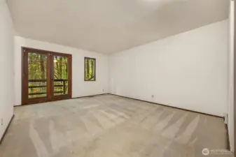 Primary suite located on the upper floor. Very private with walkout to small perch.