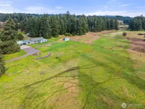 Enjoy views of fenced pastures and usable land.