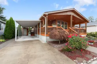 Long carport for ample off street parking w/shed