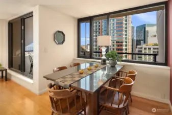 Large dining area with skyline views