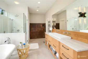 Not a detail missed, with large soaking tub, rectangular sink, and Towel Warmer in the Primary Bath.