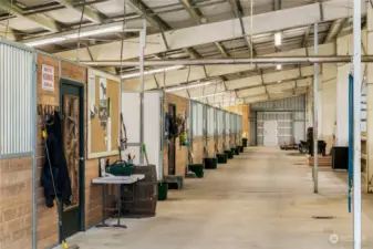 Large tack room with laundry and bathroom, 9 stalls, 2 grooming stalls, all are self-watering.