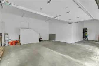 Large 2-car garage with workshop area.