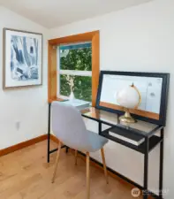 Upstairs landing area creates perfect spot to work from home.
