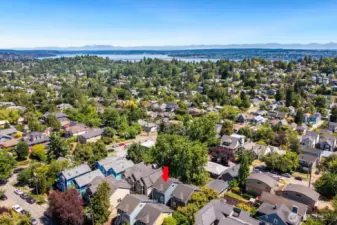 Aerial view of house and the surrounding city environment - Lake Washington in the distance