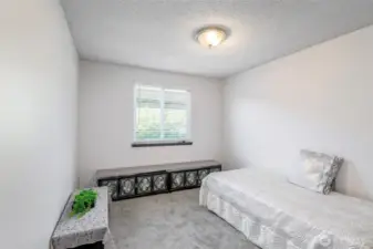 1st bedroom with new carpet and paint.