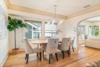 Dining space off the kitchen is perfect for entertaining. The space blends seamlessly with the living room and kitchen