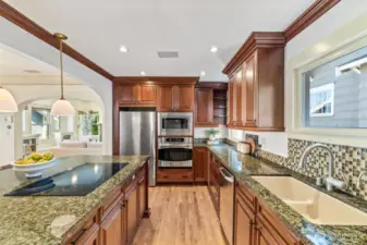 Plenty of storage and stainless steel appliances complete this beautiful kitchen