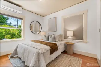 Primary bedroom that overlooks the serene patio