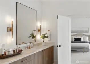 Spa-Inspired Bath: A statement in calm sophistication, the primary bath combines timeless design with modern indulgence. Dual vanities, brass-accent lighting, and a deep soaking tub invite relaxation, while the walk-in glass shower and broad picture window deliver a true spa-day atmosphere at home.  See today!