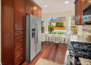 Spacious kitchen with breakfast nook.