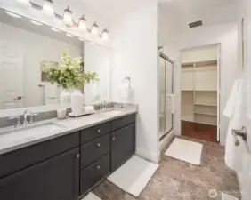 Ensuite bath with double vanity.