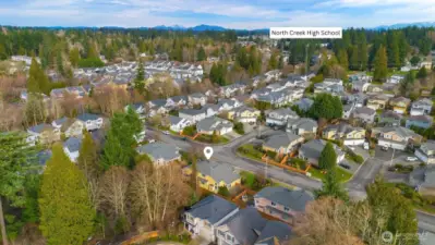 Aerial view facing East displaying close proximity to North Creek High School.