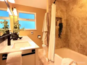 The main floor has a 5-piece bathroom and heated floors.