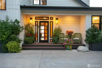 Eye catching front covered front porch, tucked away from the street for added privacy.