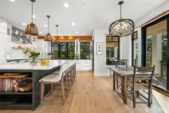 Plenty of dining space in the kitchen with the generous 5'x8' quartz island and breakfast nook.