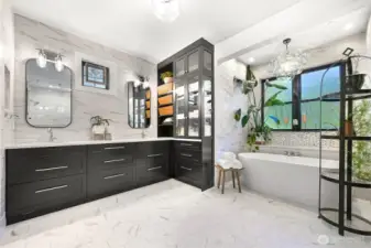 Heated tile floors, designer lighting and the soaker tub come together to create your very own spa-like experience.