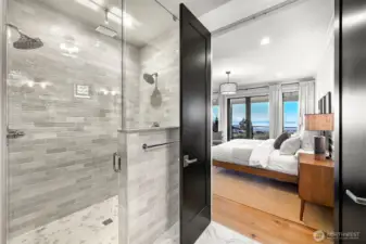 Beautiful 3-head walk-in shower with custom tile.