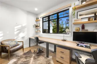 Dedicated office space on the main floor with french doors.