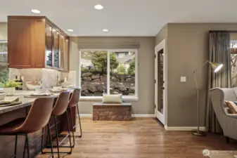 Enjoy views of the serene backyard landscaping while cooking, eating or entertaining.