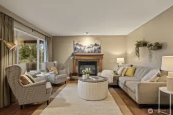 Gas fireplaces anchor both the living and family rooms, creating warm yet sophisticated gathering spaces.