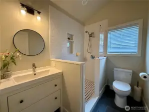 Newly remodeled main bathroom with walk-in shower.