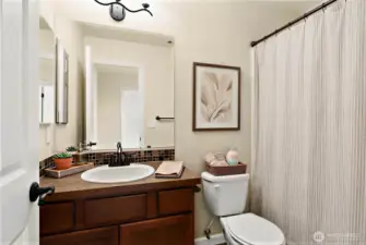 Another bathroom upstairs is perfectly located