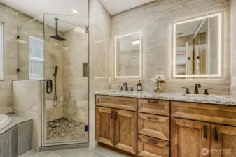 Your primary bathroom walk-in shower and soaking tub