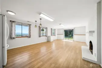 Lower level bonus room - this space offers ADU hookups if you wanted to add a kitchenette with amazing mountain views and access to a private side yard.