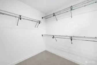 Spacious primary bedroom walk-in closet!