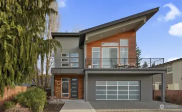 Striking architecture marks the front of the home!