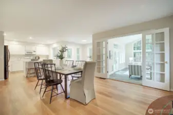 Kitchen, eating nook, and family or dining room. A great room effect.