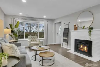 A cozy gas fireplace is ready to warm you with a flip of a switch!