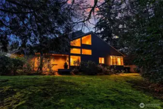 Tucked away on a private cul-de-sac, this Avant Place home is flooded with natural light from a multitude of windows and skylights that illuminate the spaces thru out the day
