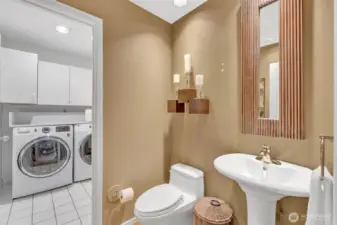 1/2 bath on the main leads to full size laundry room