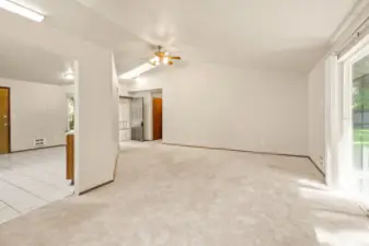 Carpets have been professionally cleaned. Living room wraps the Kitchen. Slider leads out to patio in fully fenced yard.