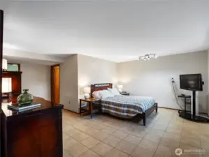 The downstairs area has been regularly rented below market value at $1,000 a month; large bedroom/living room area, 3/4 bath, and kitchen w/eating nook. Tenant had access through the garage.