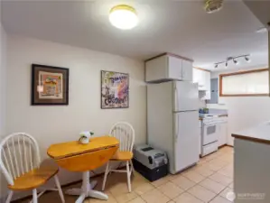 Lower level kitchenette with eating nook.