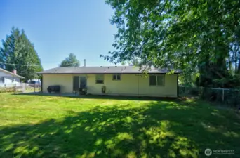View of back of house by fence