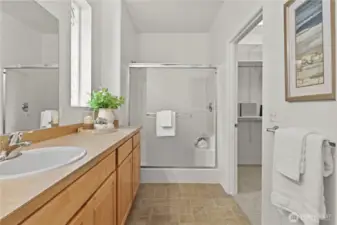 Ensuite bath with step-in shower and walk-closet.