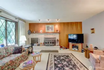 Looking toward fireplace with wood insert