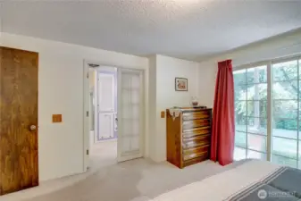 Doors out to patio and into bathroom