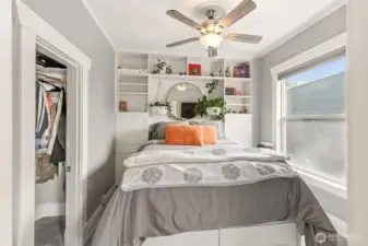 Queen size bed with built ins.