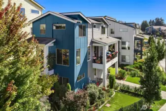 Two lovely covered decks from which to enjoy neighborhood views and the property's beautiful gardens.