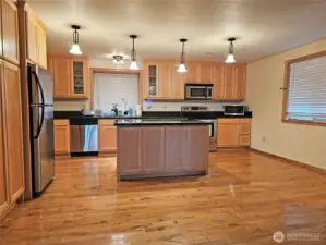 The true gem of this home is the kitchen! Well lit, lots of built in counter space, a large central island, and room for lots more!